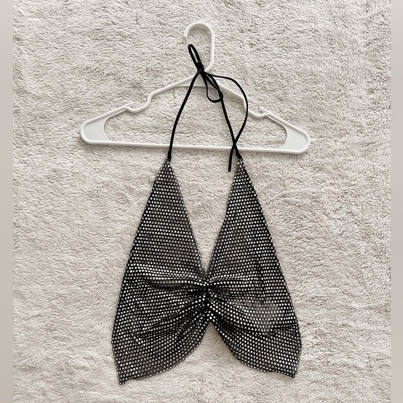 Showpo. Tops - brand new sparkly silverish crop top that has an open back.
